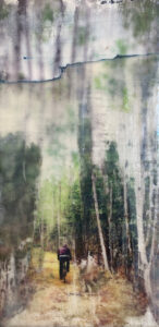 Person biking on a wooded path with tall trees and a soft, textured artistic effect.